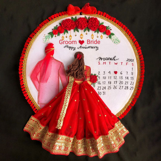 couple embroidery on cloth with save the date